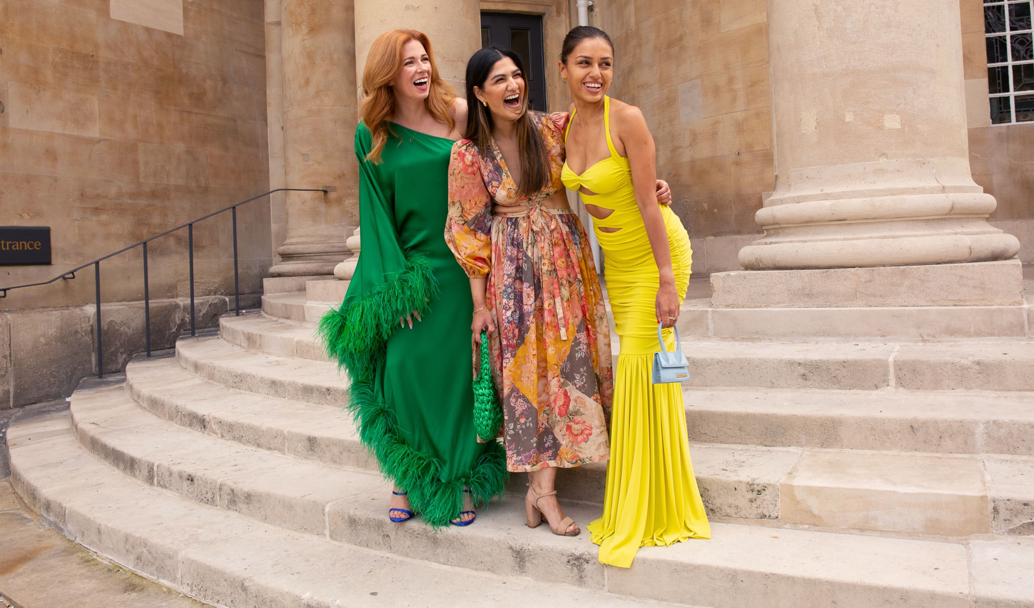 Three women smiling